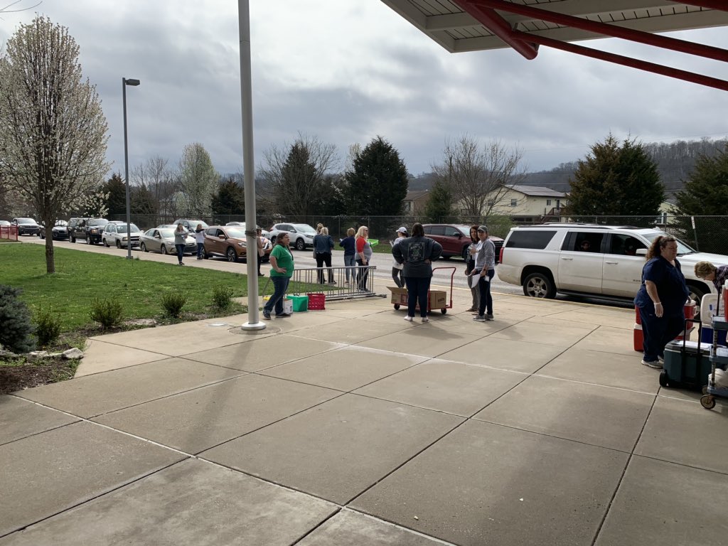 Our teachers are the best!  And they miss you!  Packet pick up was a success in the sunshine!