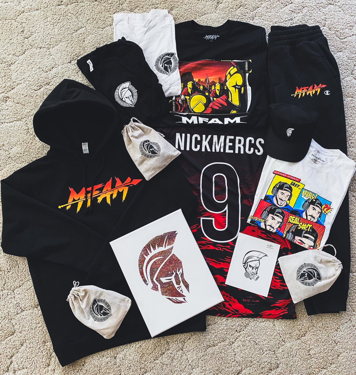 ERICTHEINVENTOR's tweet photo. got my merch the other day, cant even lie, been in the hoodie & sweats 3 days straight MFAM quarantine mode. collections growing, love ya brother @NICKMERCS β€οΈπ»
#MFAM #EmberCollection https://t.co/TpR8AYPuQ0