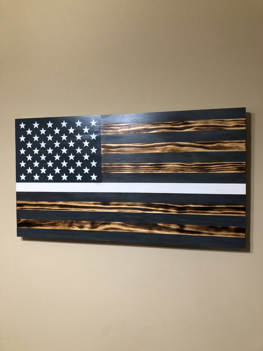 jeffersoncarley's tweet photo. Another flag is done and ready to deliver. This is a new concept. It’s a subdued white line flag meant to represent the medical field. #woodworking #healthcare #rusticflag #rusticdecor https://t.co/YWjkYcTM9o