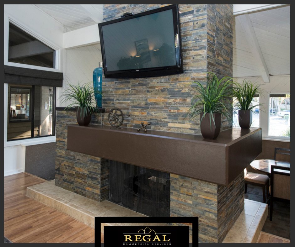 RenovationExprt's tweet photo. This is a picture of the fireplace we remodeled as part of a client's club house renovation.  

The blue in the stone gives it a warmth and inviting feel that the designers carried through to other elements in the large room. https://t.co/7yH8BSuroO