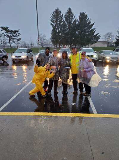 carleyrw's tweet photo. My dad and the squad running food to cars at a food pantry in Ohio in the rain yesterday like a champ 🥺❤️ https://t.co/Ie04nZszzq