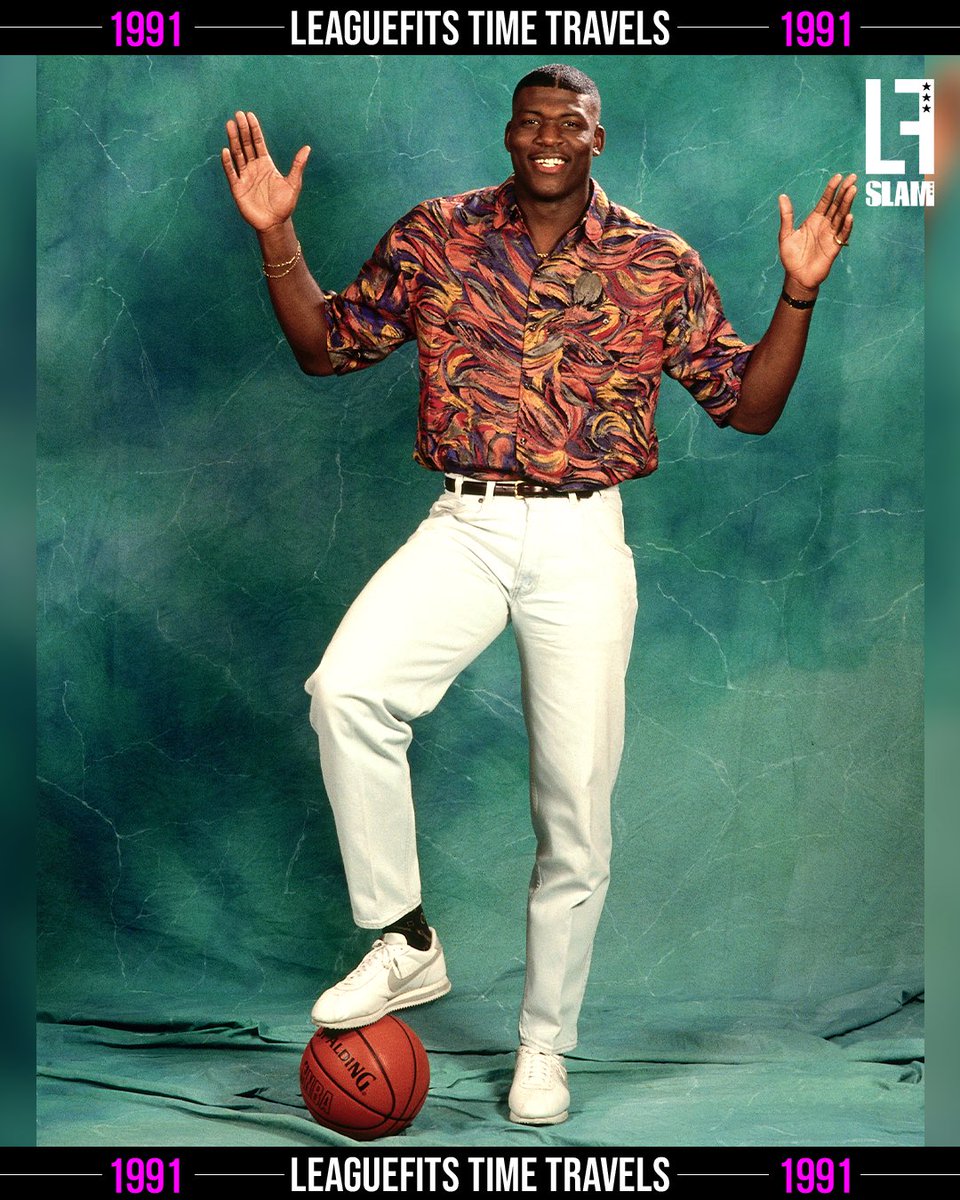 TIME TRAVELS ('91): larry johnson had one of the greatest draft day photoshoot fits of all-time.