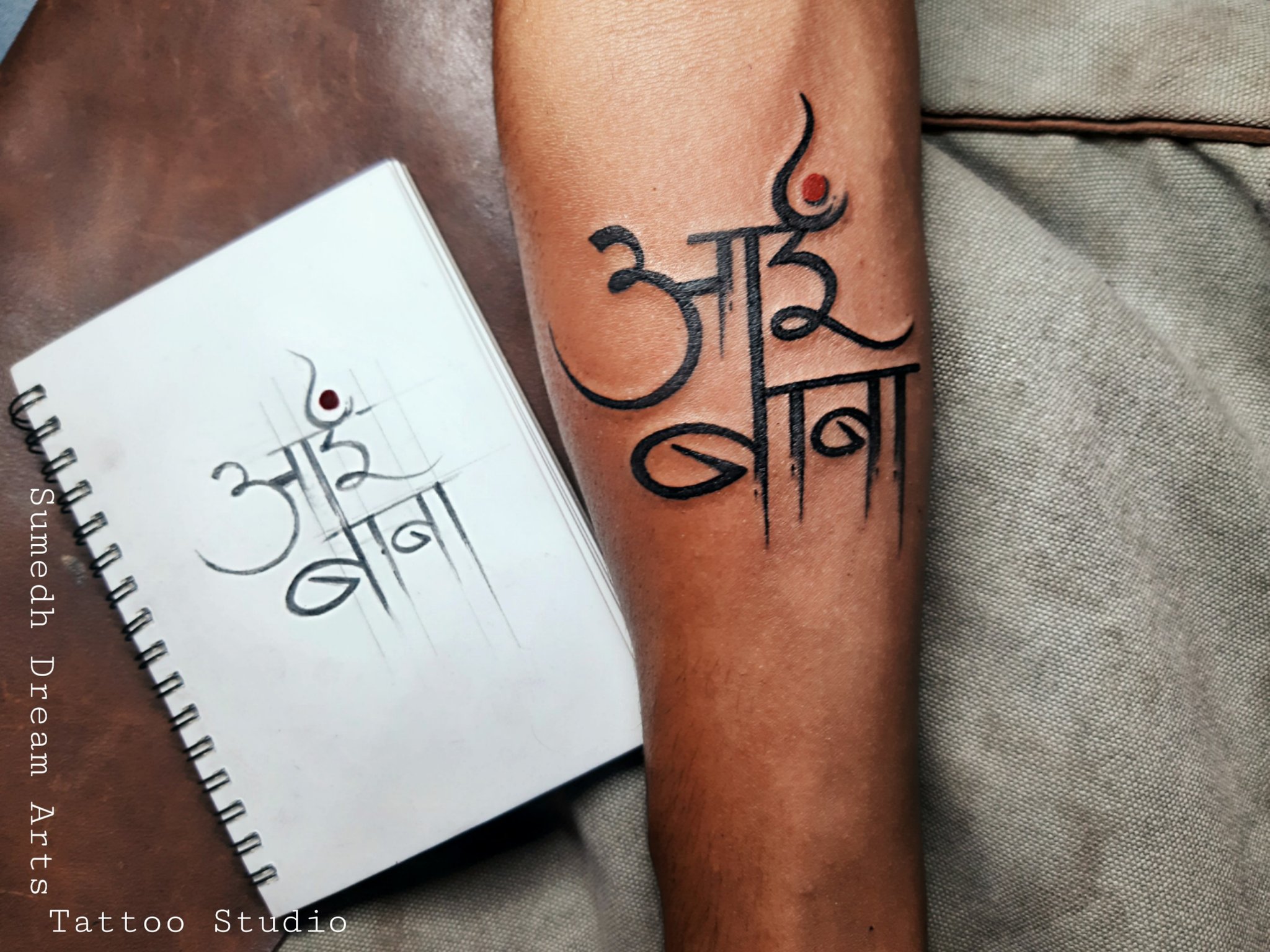 Very Nice Sai Baba Face Tattoo On Forearm