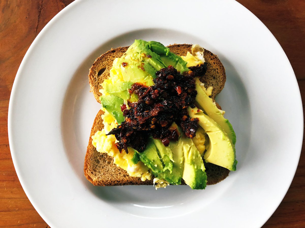 Breakfast: avocado toast with cheesy eggs and Sichuan chili crisp