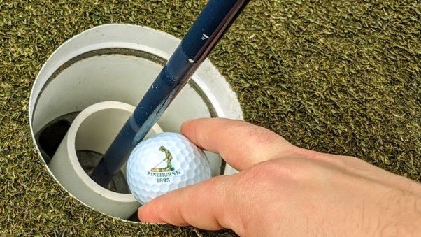 HellsPointGC's tweet photo. I saw this last night what they’re doing at #Pinehurst to keep people from touching the flagstick. It’s a great idea, very effective and simple to make. 2” PVC cut at 2 1/2” length. We’re using this at Hells Point. https://t.co/pmZJBYgGPT