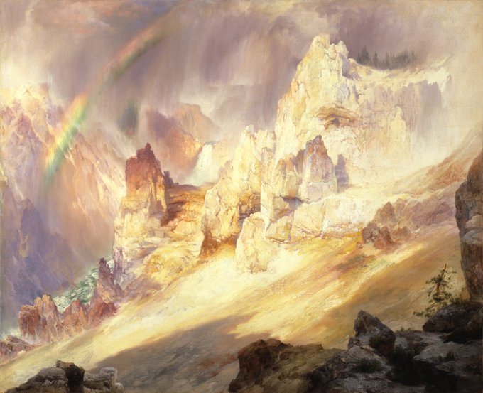 Painting of mountainous landscape with a rainbow across the sky.