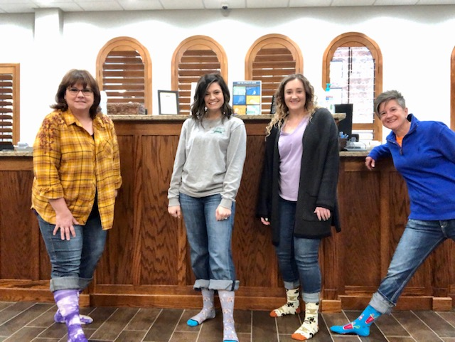 FSB1908's tweet photo. A few pictures of the #FSBCrew to brighten your morning! Today, we celebrate National Crazy Sock Day to increase awareness of Down Syndrome! #smile https://t.co/S5HKQDT8q8