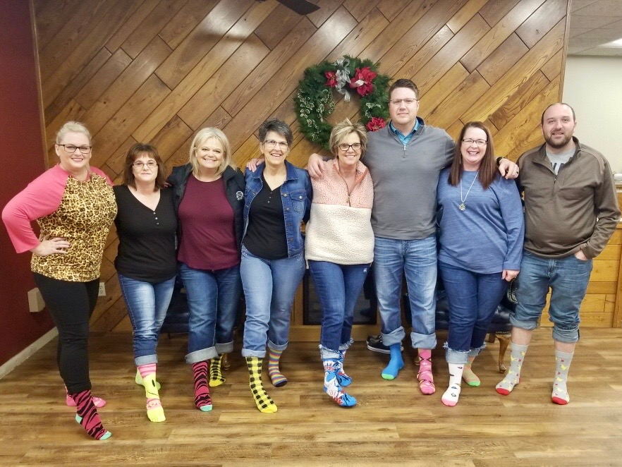 FSB1908's tweet photo. A few pictures of the #FSBCrew to brighten your morning! Today, we celebrate National Crazy Sock Day to increase awareness of Down Syndrome! #smile https://t.co/S5HKQDT8q8