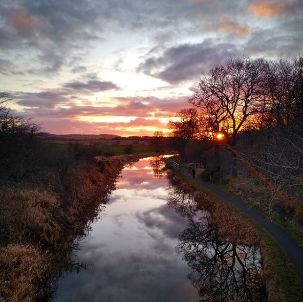 MyLinlithgow's tweet photo. What a lovely shot from your #walk @msimpk
#linlithgow #thebings #philpstoun #canal #scotland #sunset #nature #towpath #walking #trees #clouds #reflections #scotlandexplore #staysafe #stayhealthy #mylinlithgow https://t.co/rPQXqmYYYz