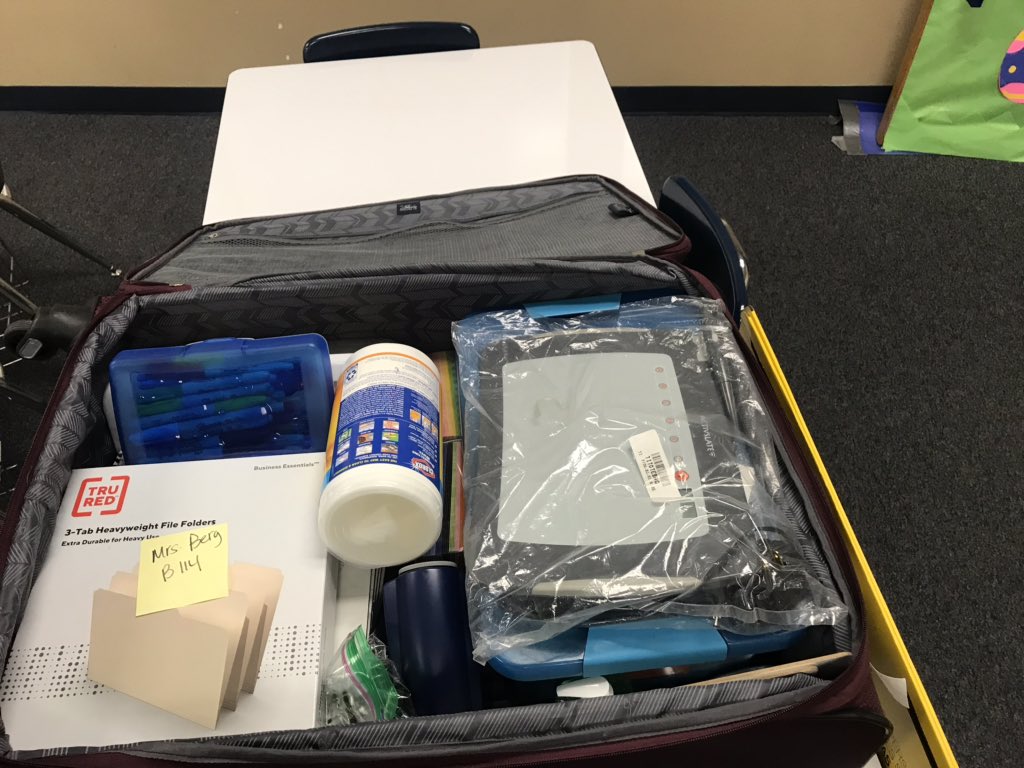 EBergMath's tweet photo. ISMS version of “supermarket sweep”. I packed up what I need for virtual learning and got to briefly see my peeps - keeping a social distance of course! #TalonsUp #celebrateKISD #KISDMathSquad https://t.co/HXDpbvTBbH