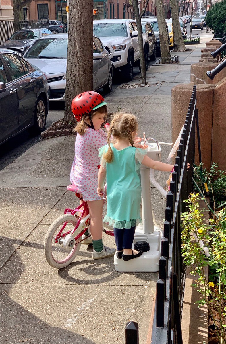 ebkent's tweet photo. @livability @Fred_Kent @melodywarnick @aleykent @placemakingus @PlacemakingX @CobbleHillAssoc @ioby @NhoodPlays @LocalEmpower @frontporchforum @FrontPorchRepub Kids #handwashing in our neighborhood streets today. #placemaking https://t.co/OlQi2g9oVQ