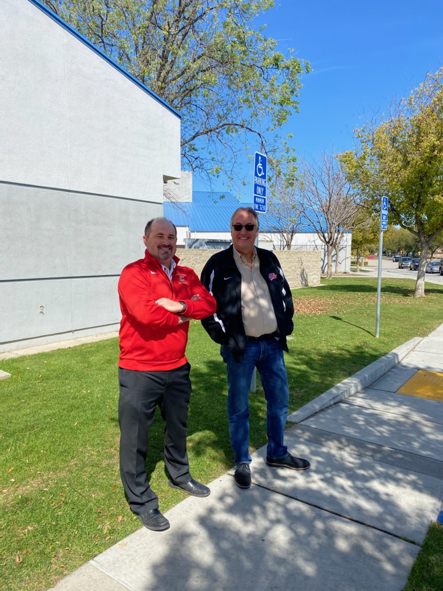 CentennialHawks's tweet photo. Dr.Bryon Schaefer and Principal Guinn out helping serve our Centennial community lunch today. @KHSD_Official https://t.co/fH4KnQtq6E