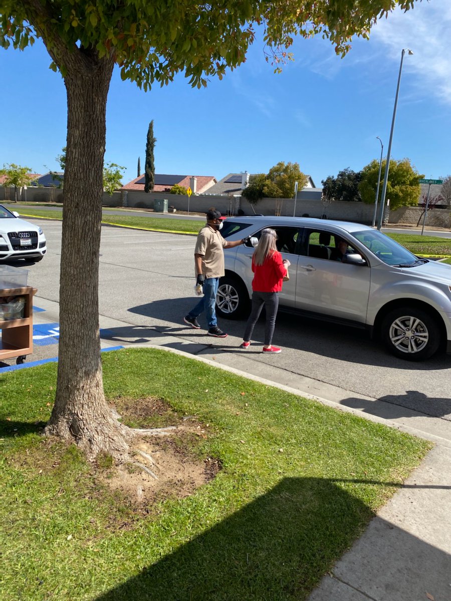 CentennialHawks's tweet photo. Dr.Bryon Schaefer and Principal Guinn out helping serve our Centennial community lunch today. @KHSD_Official https://t.co/fH4KnQtq6E