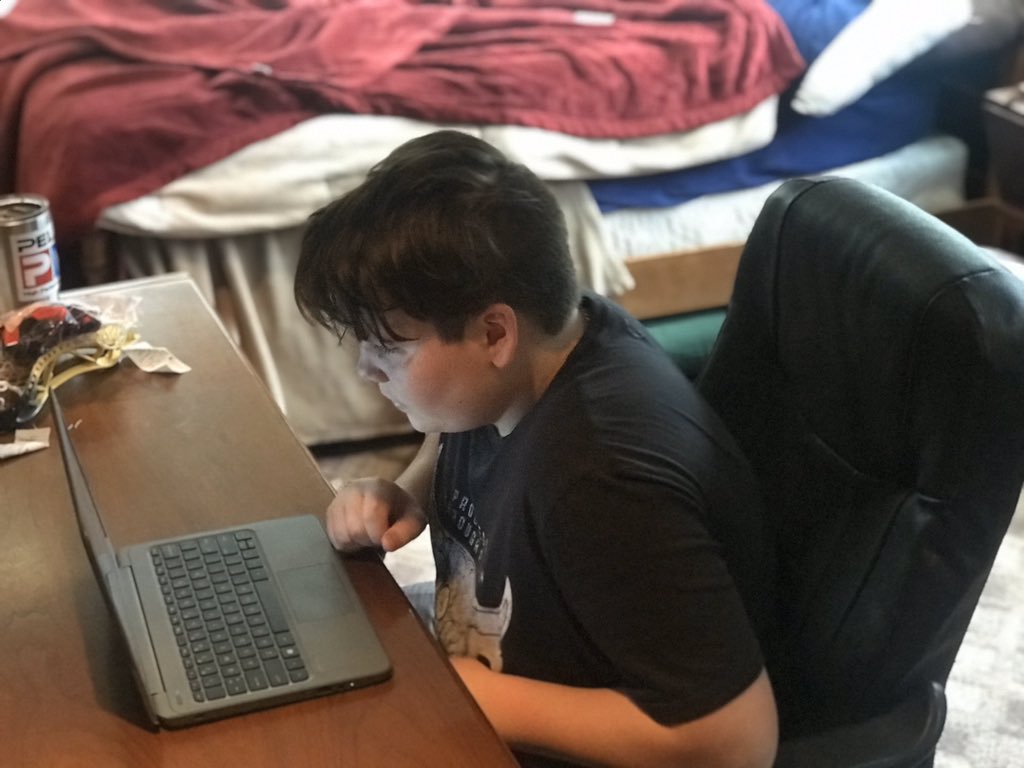 AnneRickwood's tweet photo. Wes participated in his first Zoom meeting with his ELA teacher, Mrs. Jones. He was so excited to see her and his classmates again. ELA, math, social studies...awesome job CMS! Keeping student minds active!  #CalvertLearns  #cmstigers #CalvertGetsItDone https://t.co/XgfWxLVE56