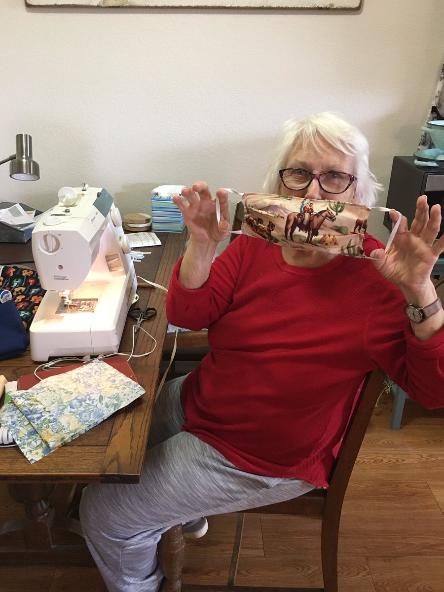 StacySlayden's tweet photo. My angel of a grandmother is sewing masks to send to healthcare workers all over the country to help with the shortage. 

She said she wanted to “give them a little taste of Texas!” 😭💙♥️🤍

I. Love. Her. So. Much. https://t.co/yJqB0eJtWr