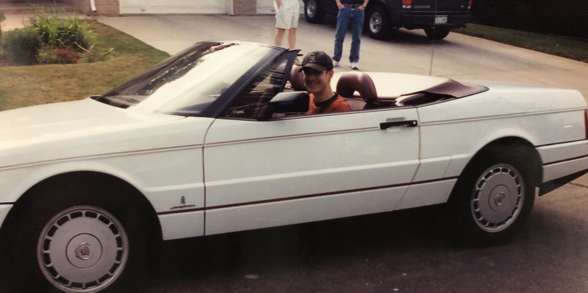 DougDeMuro's tweet photo. My mom has discovered another gem: here I am, probably age 15, sitting in a family friend's Cadillac Allante. Now THIS was a cool car!

At the time, I thought he was crazy for not getting the Northstar - but then the head gaskets started failing, and he looked like a genius! https://t.co/4ffk81FzZA
