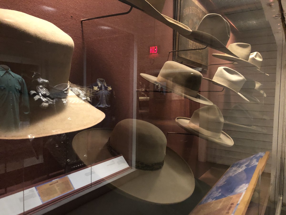 ncwhm's tweet photo. I’m wearing a lot of hats now. Here are some hats I can’t wear. They're behind glass. Seth in Marketing told me I could share this web address of a Virtual Tour of The Cowboy. It’s a long address so get a pen and paper ready #HashtagTheCowboy Thanks, Tim 
https://t.co/8DFS8Kv4lr https://t.co/zLisrehjhl