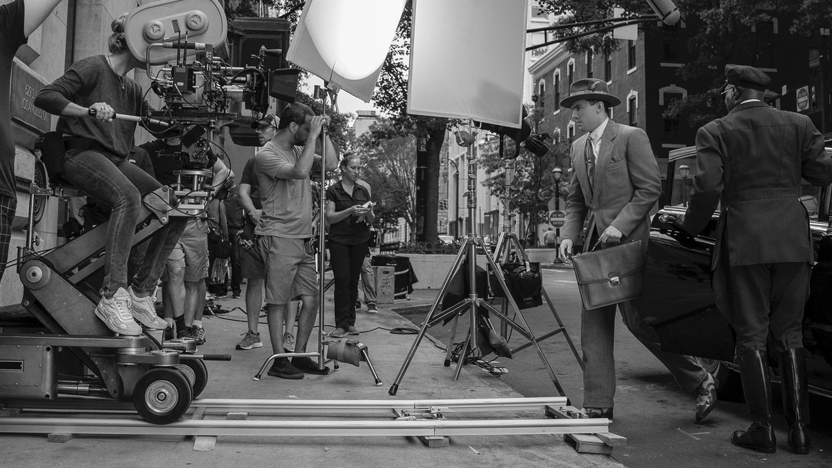 AppleTV's tweet photo. On the set of #TheBanker, starring @AnthonyMackie and @SamuelLJackson. The film tells the story of two entrepreneurs who risk everything to take on housing discrimination in the 1960s. Watch it now on the Apple TV app with an Apple TV+ subscription: https://t.co/FqDN6q5JXY https://t.co/8uznHGDC7G