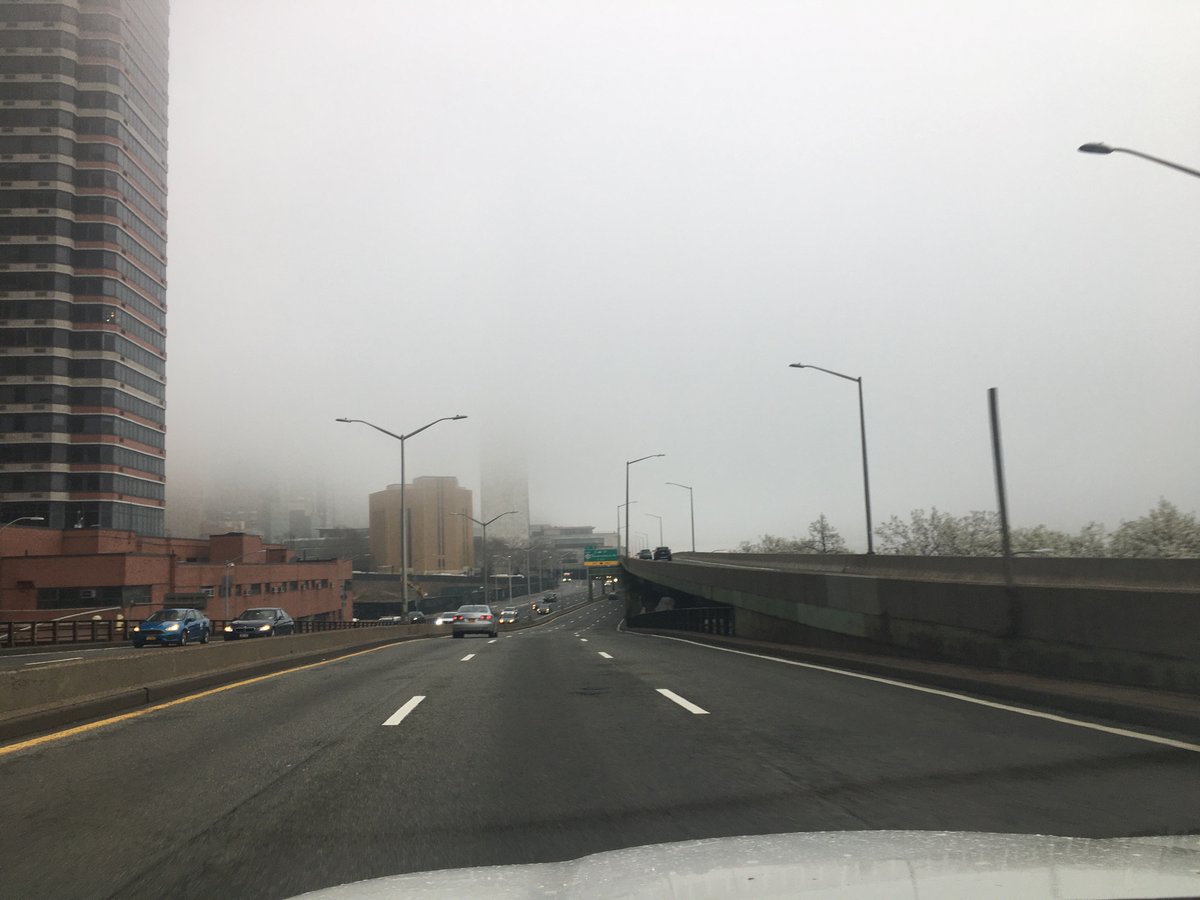 Even the skyscrapers seem to be self-quarantining behind a curtain of fog. FDR, heading north, rush hour.