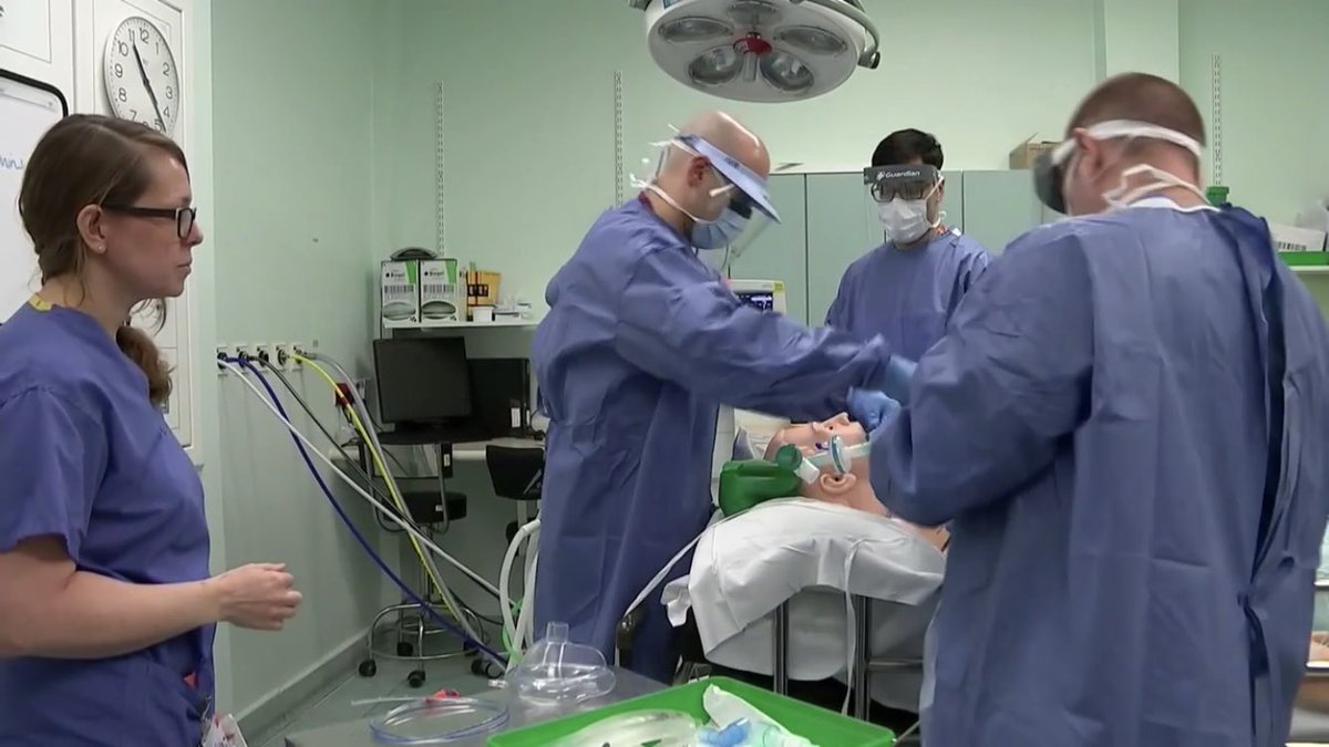 One of the most high risk procedures involves intubating a Covid-19 patient [simulation mannequin here & instructor watching on] due to medic/patient mouth proximity…