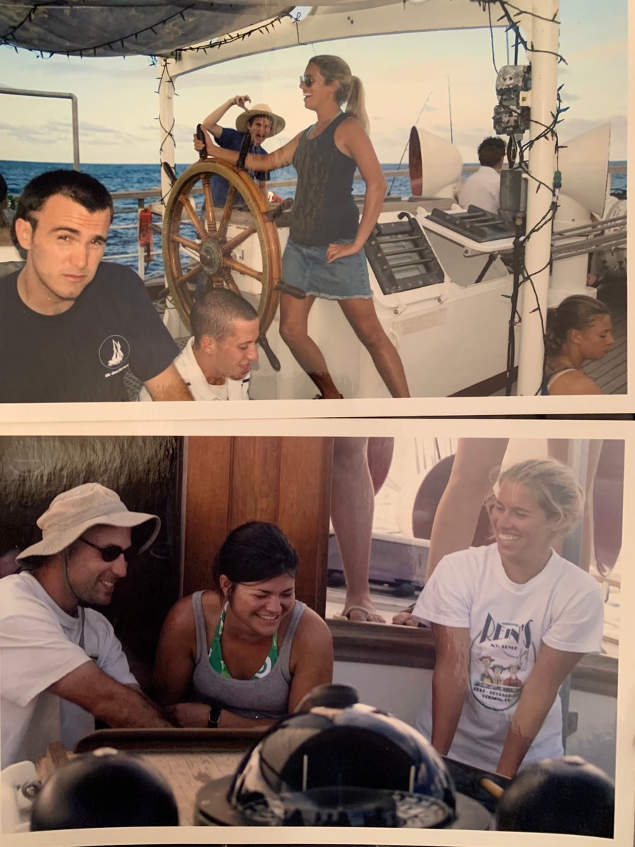 Me at the helm and laughing on deck