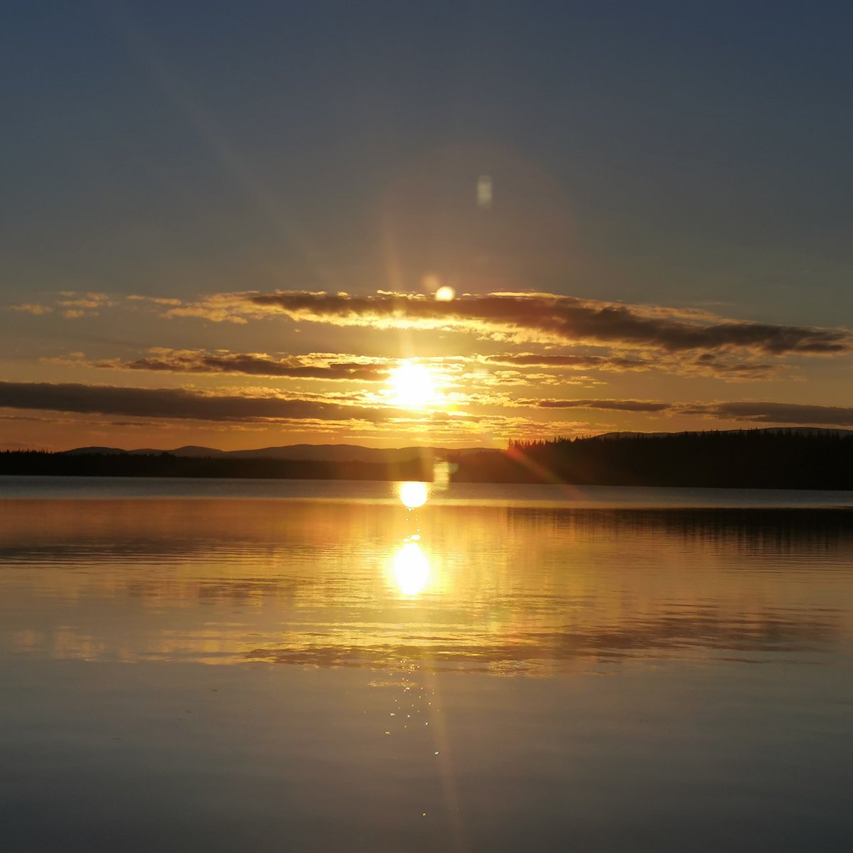 Volteral's tweet photo. Social distancing last night at #lochmorlich and what a #springequinox2020 #sunset https://t.co/iTS7LximbU