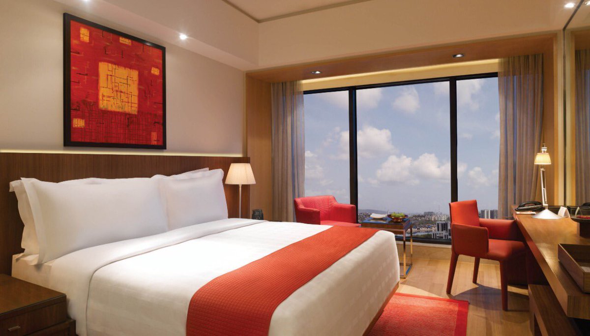 TridentHotels's tweet photo. Plush comfort and a breathtaking view – your stay at @TridentBKC in a nutshell.

#TridentHotels #TridentBandraKurla #BandraKurla #Mumbai #TridentExperiences #RoomWithAView #TridentStaycation #Staycation #Holiday #Getaway https://t.co/FSuq6NDVCr