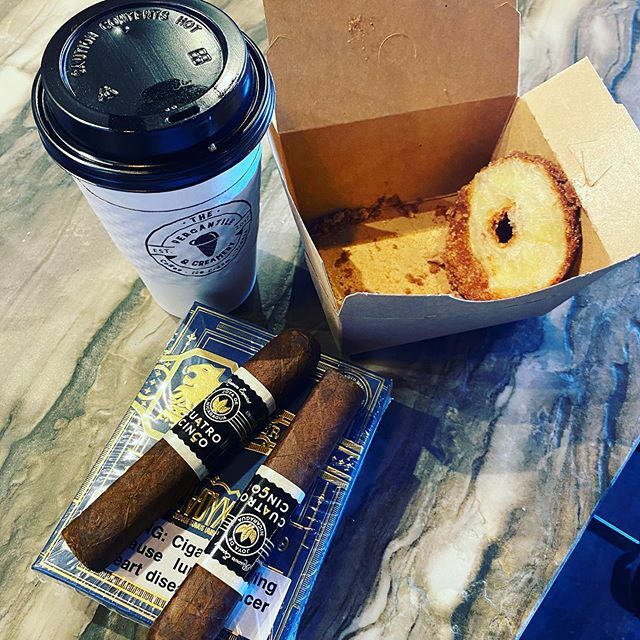 Starting the day off with a cronut by @sugarrmann from @the.percantile with one of their signature drinks, The Calico and a #cuatrocinco by @joyacigars from @drewestatecigar! We’re here for your Grab N Go needs! ift.tt/2WAaQBB