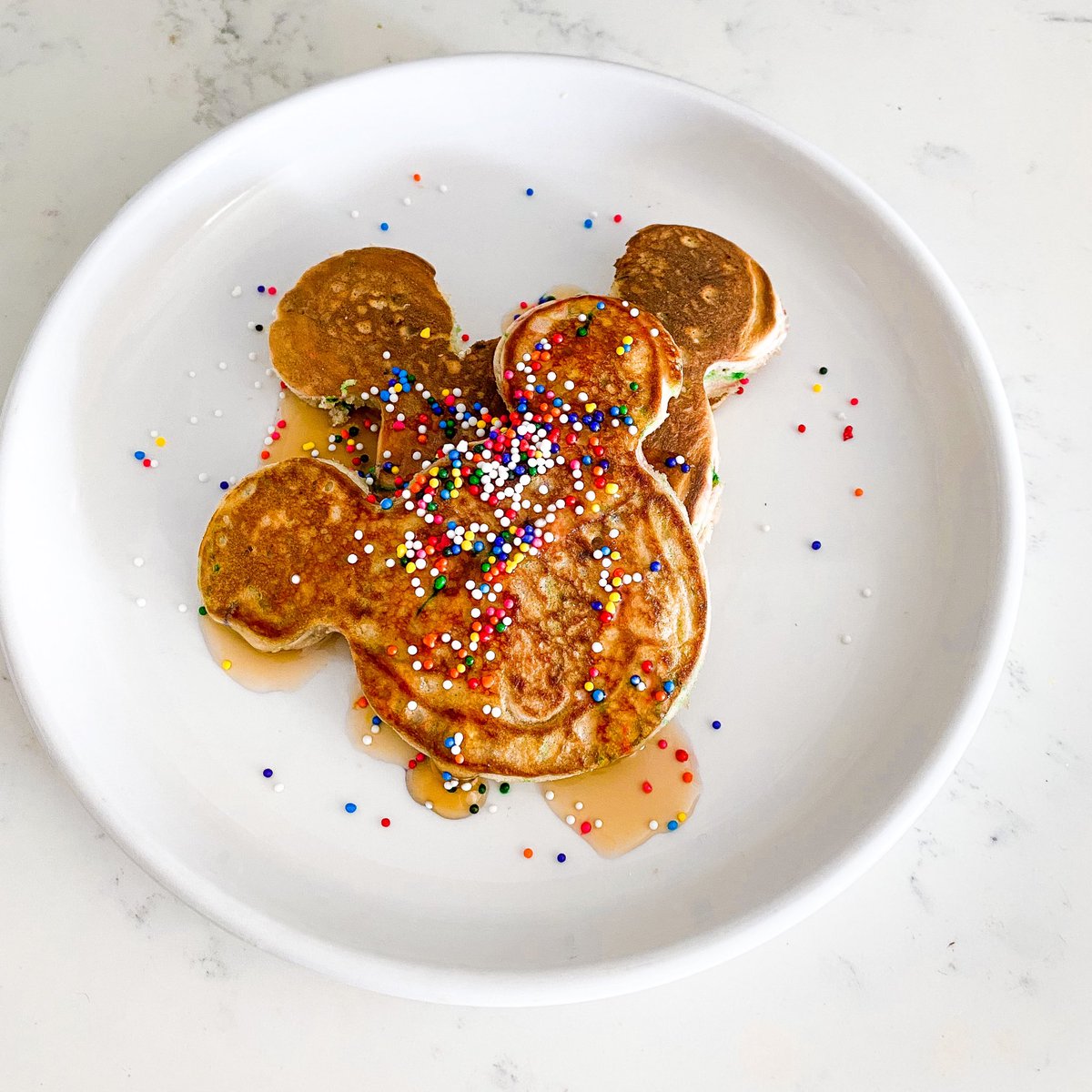 Now available at the PARTY TIME booth.  Mickey Celebration pancakes with crunchy rainbow sprinkles.