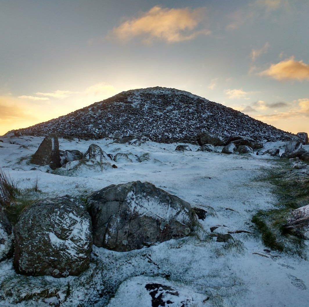 DrCiaranMcDonn's tweet photo. #Throwback to a stunning equinox sunrise at Loughcrew a few years ago, with sunlight illuminating the 5000 y/o passage tomb. Absolutely magical. https://t.co/EBeccFr5yy