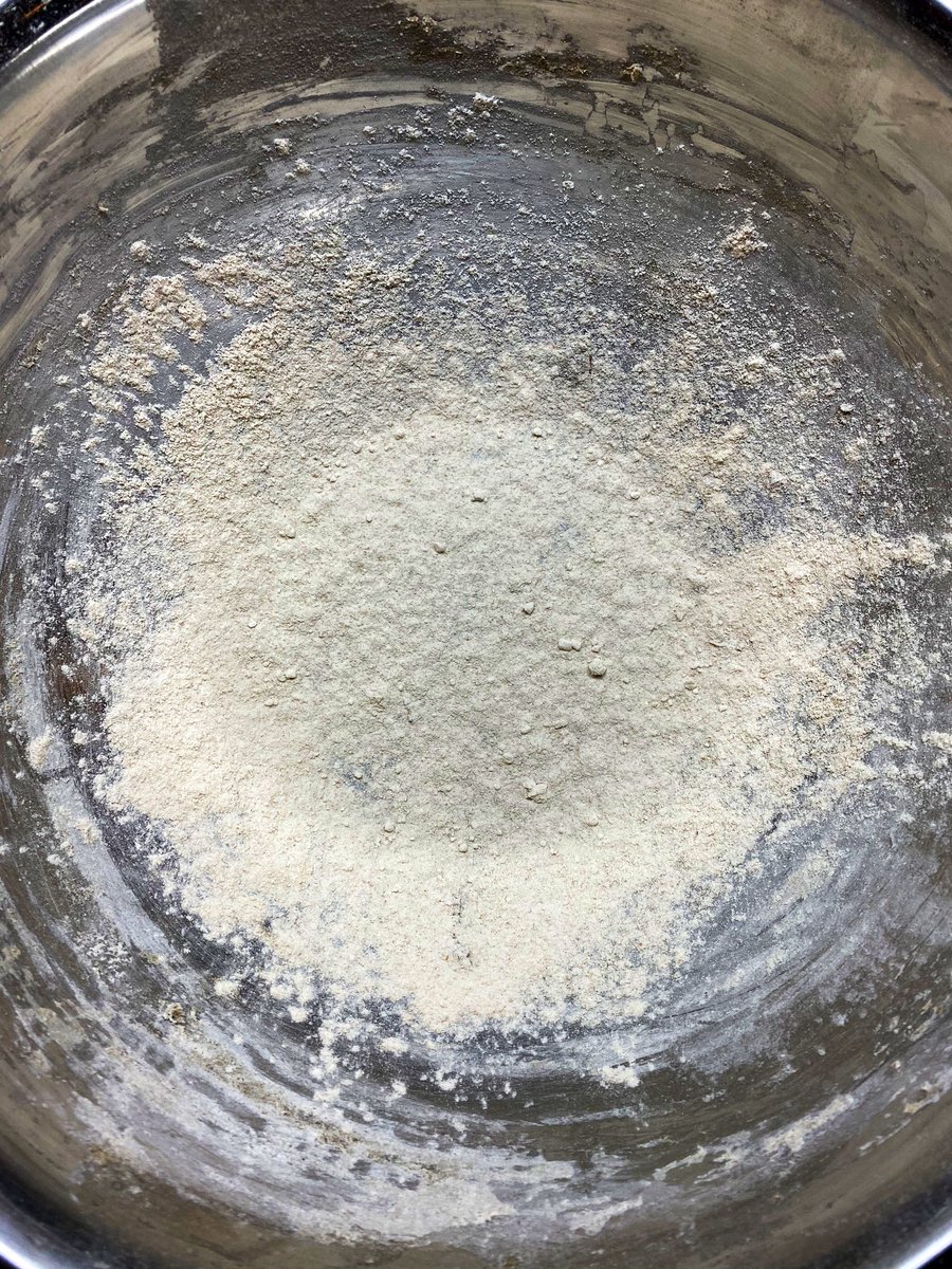 OK adding salt. This is sea salt, which was common in antiquity. The Egyptians may have also used mined salts but I digress. Flour a bowl (whole meal grains are far better nonstick coatings than white flour BTW) and fold your salt in.