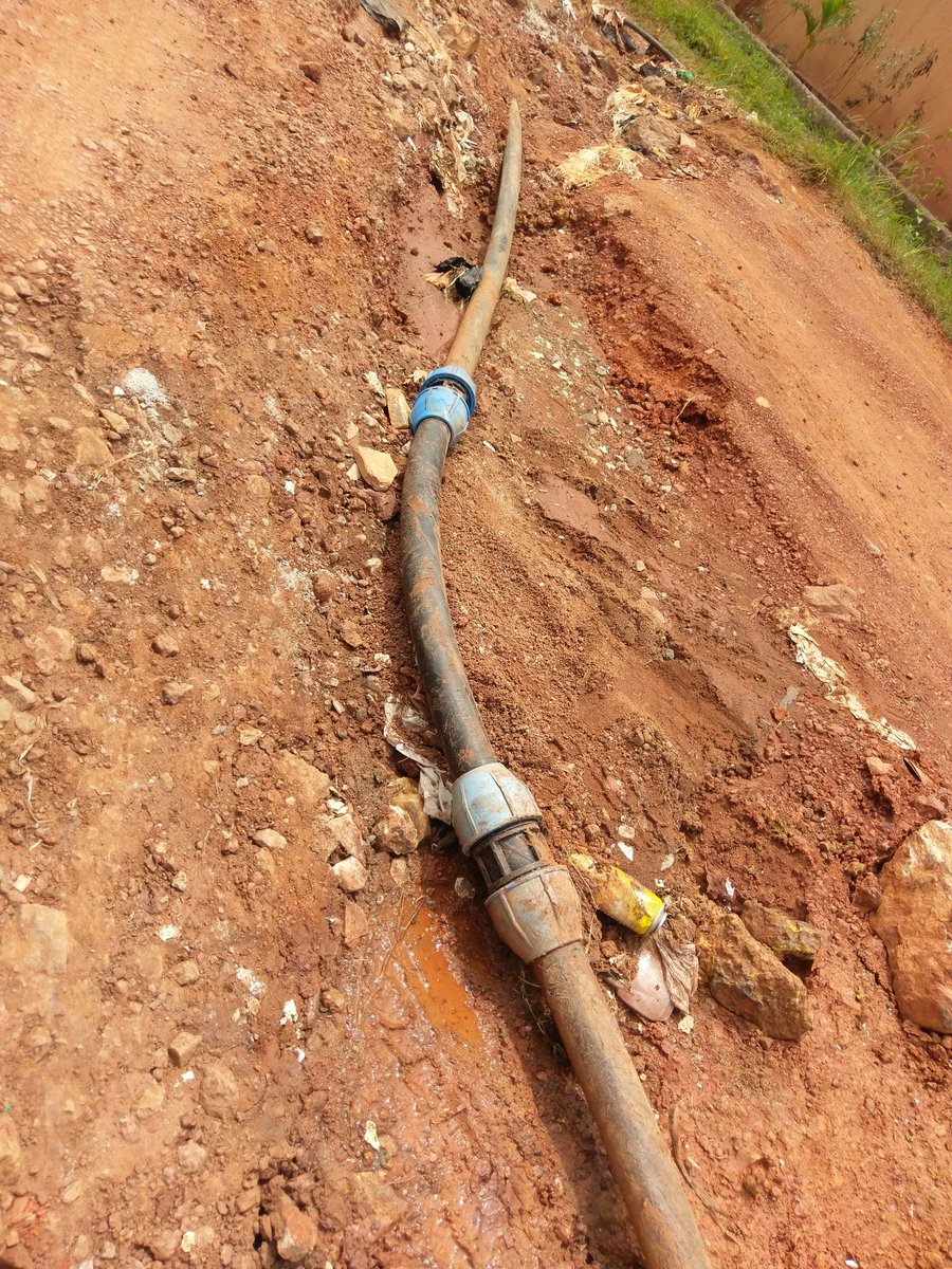 ssekono's tweet photo. I cannot believe this is the level of work National Water is doing. This water pipe has been laid exposed like this close if not for more than a year in Bukasa. Vehicles keep running over it and bursting it open. We expect professional levels of workmanship and not this. @nwscug https://t.co/dw8GFj8xKt