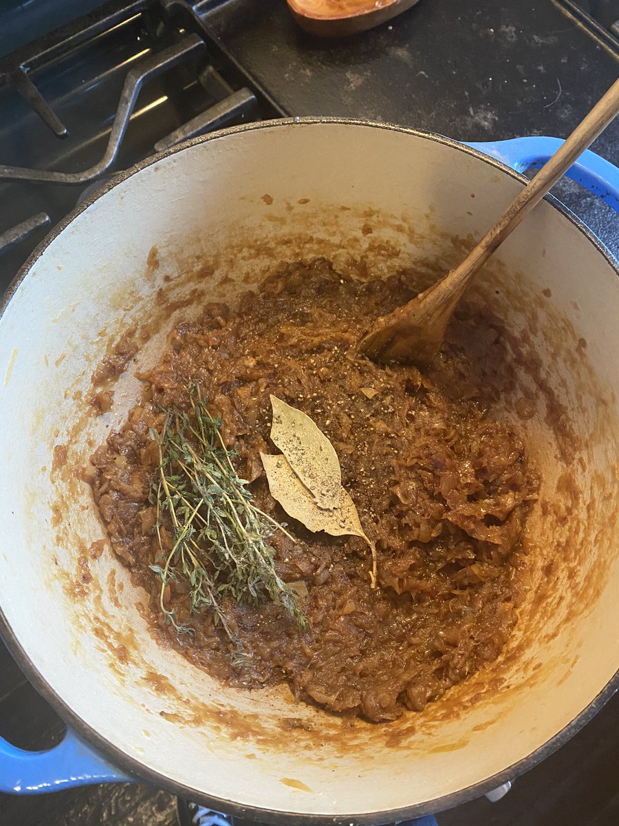 Okay. 2 bay leaf, couple big sprigs of thyme, a few cracks of black pepper. White pepper goes in now too but CAUTION: white pepper is a super strong flavor and can easily fuck your soup. Be super sparing. Add more if you want but real incremental. Added about 1.5 QTs stock.