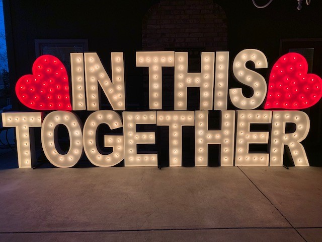 KCTV5's tweet image. From Alpha-Lit KC: “We are sending love, hope, and safety to our beloved city tonight. We did this set up at our personal home in Overland Park and will do more setups for Kansas City to enjoy from the comfort of their own home. We all are IN THIS TOGETHER.”