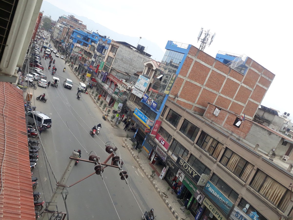 yesitislong's tweet photo. This is Kumaripati, Lalitpur, Nepal from my office room. The road is getting deserted. https://t.co/ATJ2lxh9OI