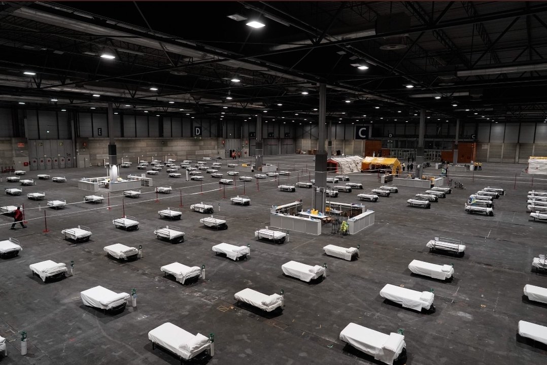 VictorSarramian's tweet photo. @cookstaar @drkatieward @TowerHamletsNow This was Madrid yesterday.  A conference centre used for coronavirus patients.  War times. Move fast England! https://t.co/rMGofJBQcV