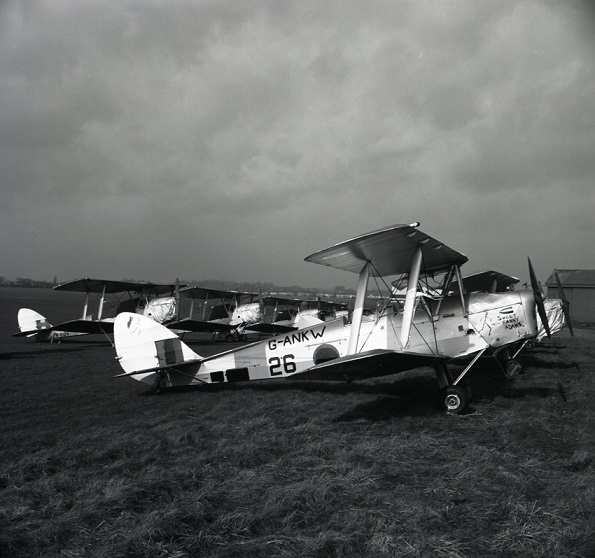 Today's Header Photo is another #dehavillandtigermoth  ex T7793  soon to be G-ANKV  at #croydonairport Feb 1954. In 1953 the RAF auctioned off many Tiger Moths & some were bought by Croydon based Rollasons & Jim Whittemore thus rows of Tiger Moths could be seen there in 1954.