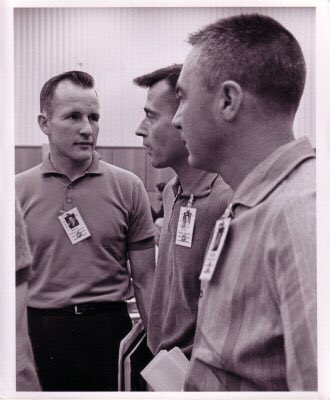 ChasingMoonBk's tweet image. March 22, 1965: Astronaut Ed White with Gemini 3’s prime crew John Young and Gus Grissom during a Gemini Launch Vehicle Review Meeting at the Manned Spacecraft Operations Building, Merritt Island, Florida.