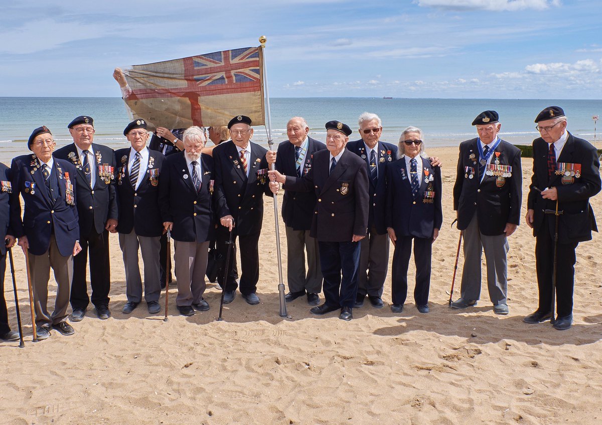 trevorbmbagency's tweet image. As teenagers, these fellas defeated fascism on your behalf, on this actual beach. All they ask in return is that you go home, wash your hands and sit on your sofa until further fucking notice. Thanks.