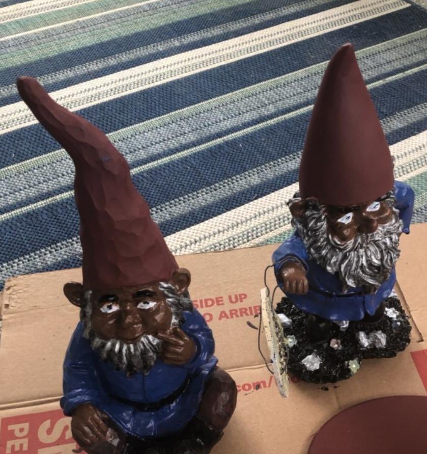 my aunt got so bored in quarantine that she painted her garden gnomes black because “the white men in front of her house weren’t sitting right with her spirit”