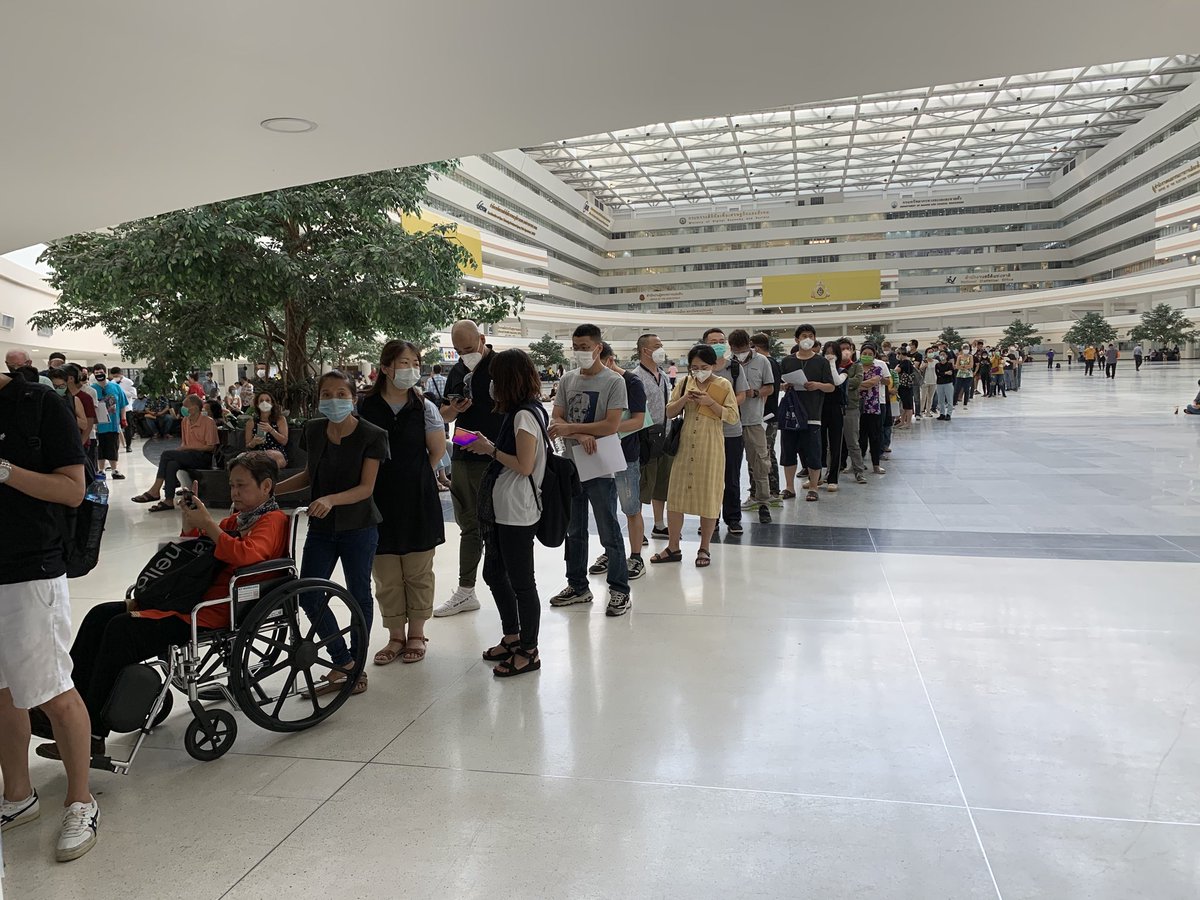 humbird's tweet photo. #Thailandimmigration Waiting for their #visas at immigration in #Bangkok. Social distancing in full force with only 50 people being let into the hall at a time. https://t.co/Ai8PoDtyQi