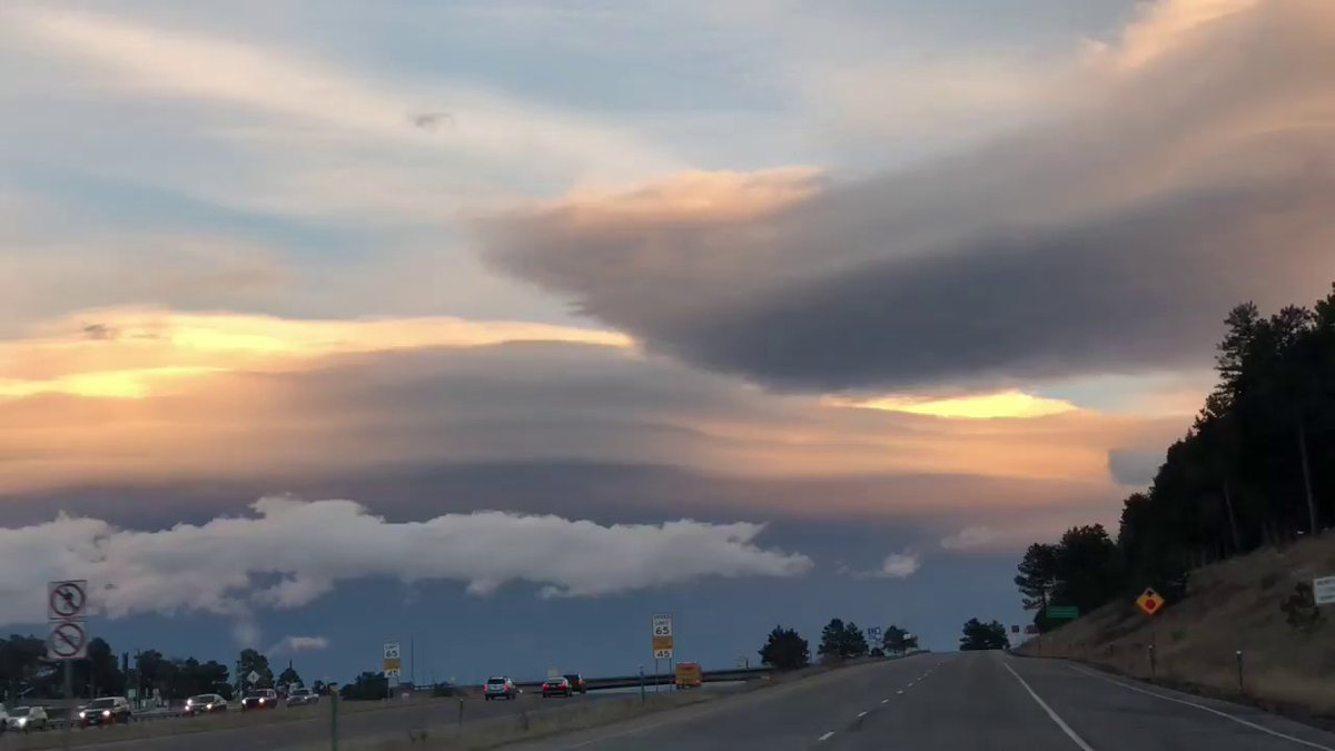 SPECTACULAR lenticular clouds at sunset west of Denver, CO! buz.tw/2EenD