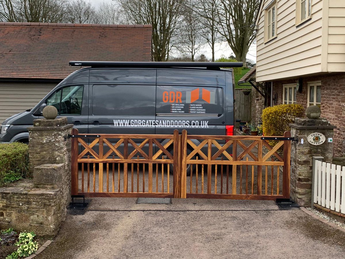 GatesGdr's tweet photo. A lovely customer knew exactly what he wanted and we delivered these stunning Iroko hardwood gates! Hung off the existing stone posts and GDR fully automated them with. Have a project you want us to look at? Drop us a DM! #gdrgatesanddoors #bespokegates #gateautomation https://t.co/ihz6lOvazn