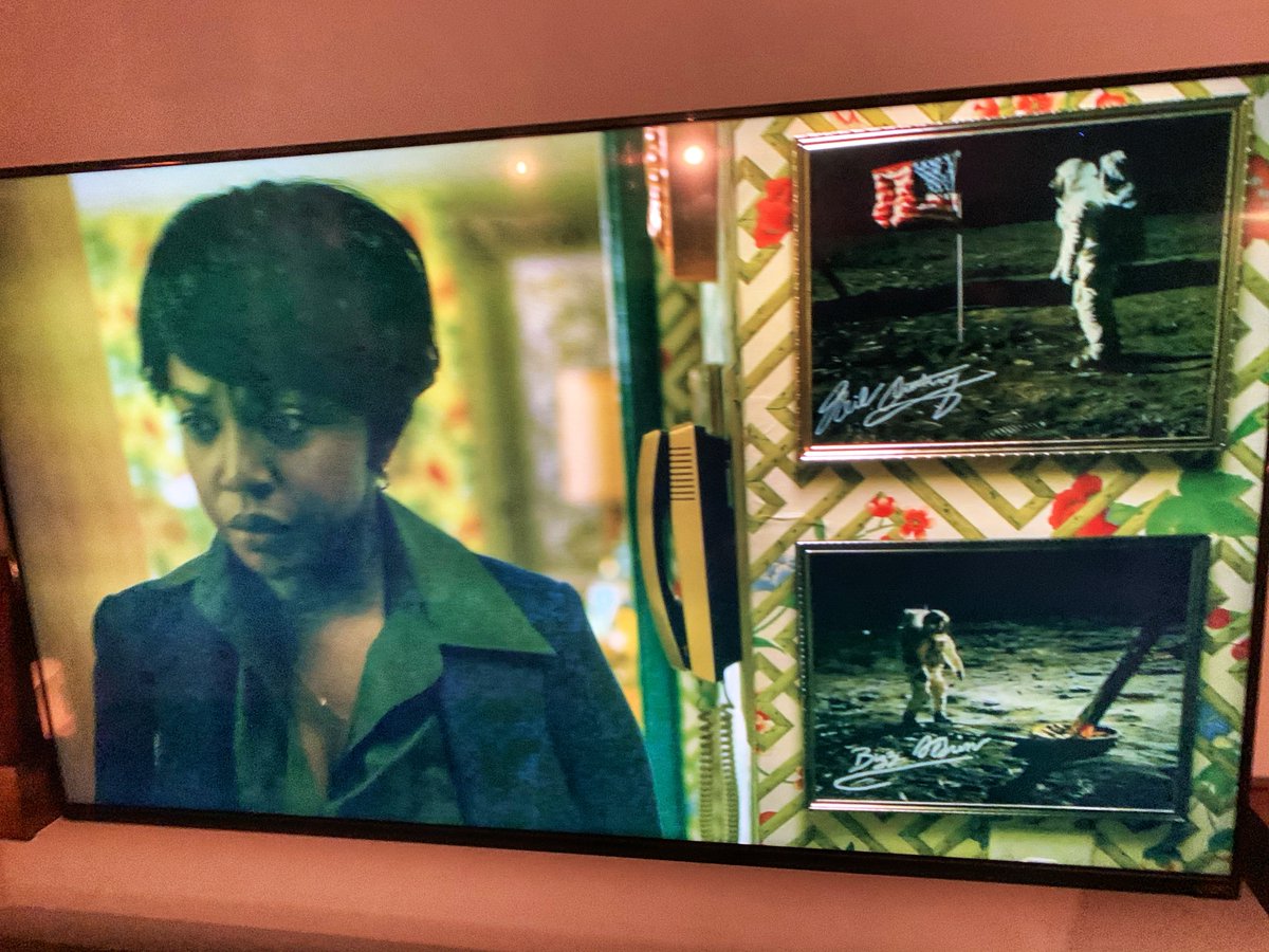 Steve_Grad's tweet image. Hey @SteveZarelli check this out.  The researchers at @PrimeVideo doing a poor job on Hunters.  Caught these two "signed" photos in the background (Armstrong/Aldrin) in what looks like white paint pen in 1977.  Also the fact they look like a two year old did them.  #badresearch