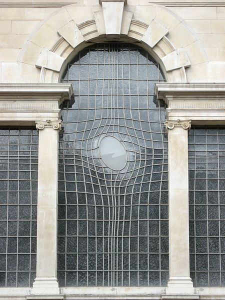 It looks decidedly different at different times of day and night. Here's a view from outside. Photo by G. Giuseppini, licence details here  https://commons.wikimedia.org/wiki/File:East_Window_of_St_Martin_in_the_Fields_-_panoramio.jpg