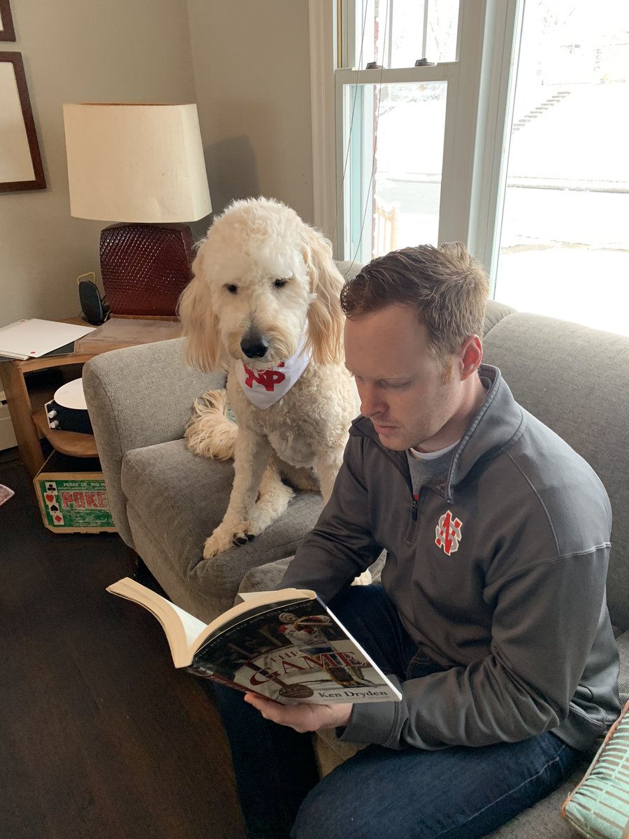 NorthScottVGES's tweet photo. National Puppy Day! Stanley Pup and I reading about six-time Stanley Cup winner Ken Dryden. #NSLancers https://t.co/kXiRND1xov