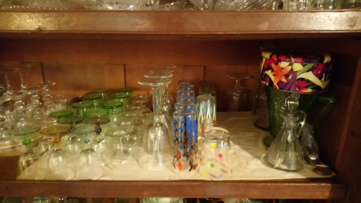 SimonRLCarter's tweet photo. Am moving so have already packed the books, but here's my glass cabinet a few weeks ago before I started wrapping it all - about 1/2 way through now #problemwhatproblem #hoarderorcollector? #ShowUsYourShelves https://t.co/hcIqM59J4v