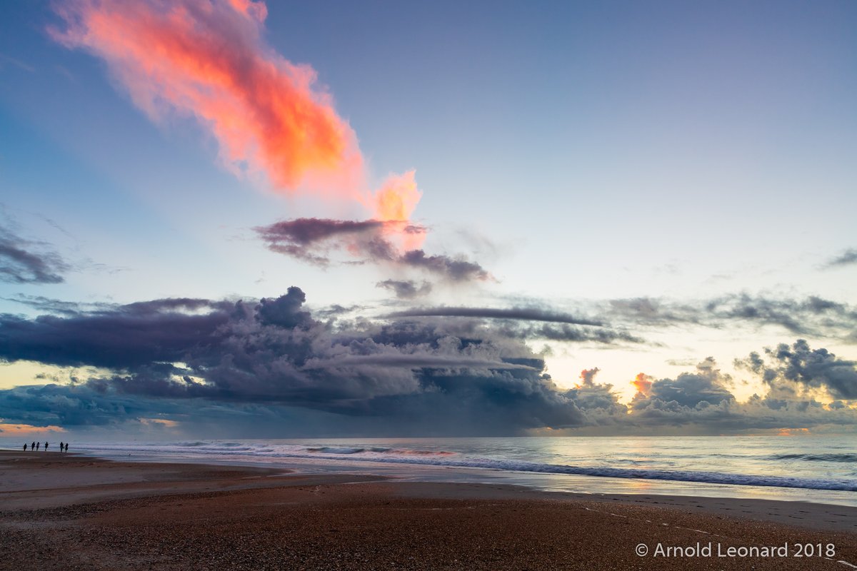 arnlee's tweet image. "Sunrise Storm Over the Atlantic"  Distant storm clouds sitting low over the ocean with the sun rising behind them. From Wrightsville Beach, NC.  #seascape #sunrise