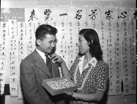 3. “Helen Chan and Sun Lum demonstrate the lapel buttons issued to Chinese Americans, used to distinquish Chinese peoples from Japanese" http://content.cdlib.org/ark:/13030/hb1g5003tx/?layout=metadataPhoto credit:  @latimes via UCLA http://digital2.library.ucla.edu/viewItem.do?ark=13030/hb1g5003tx