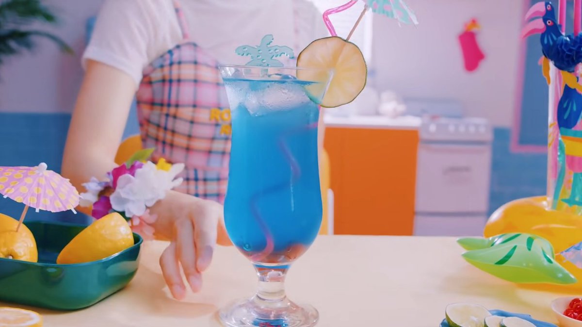Bungee:On Binnie's kitchen counter you can see lime wedges, lemons, and a bowl of Maraschino cherries. Both Mimi and Arin are wearing a bracelet with a lime wedge. Binnie is wearing a pin with a cherry design.